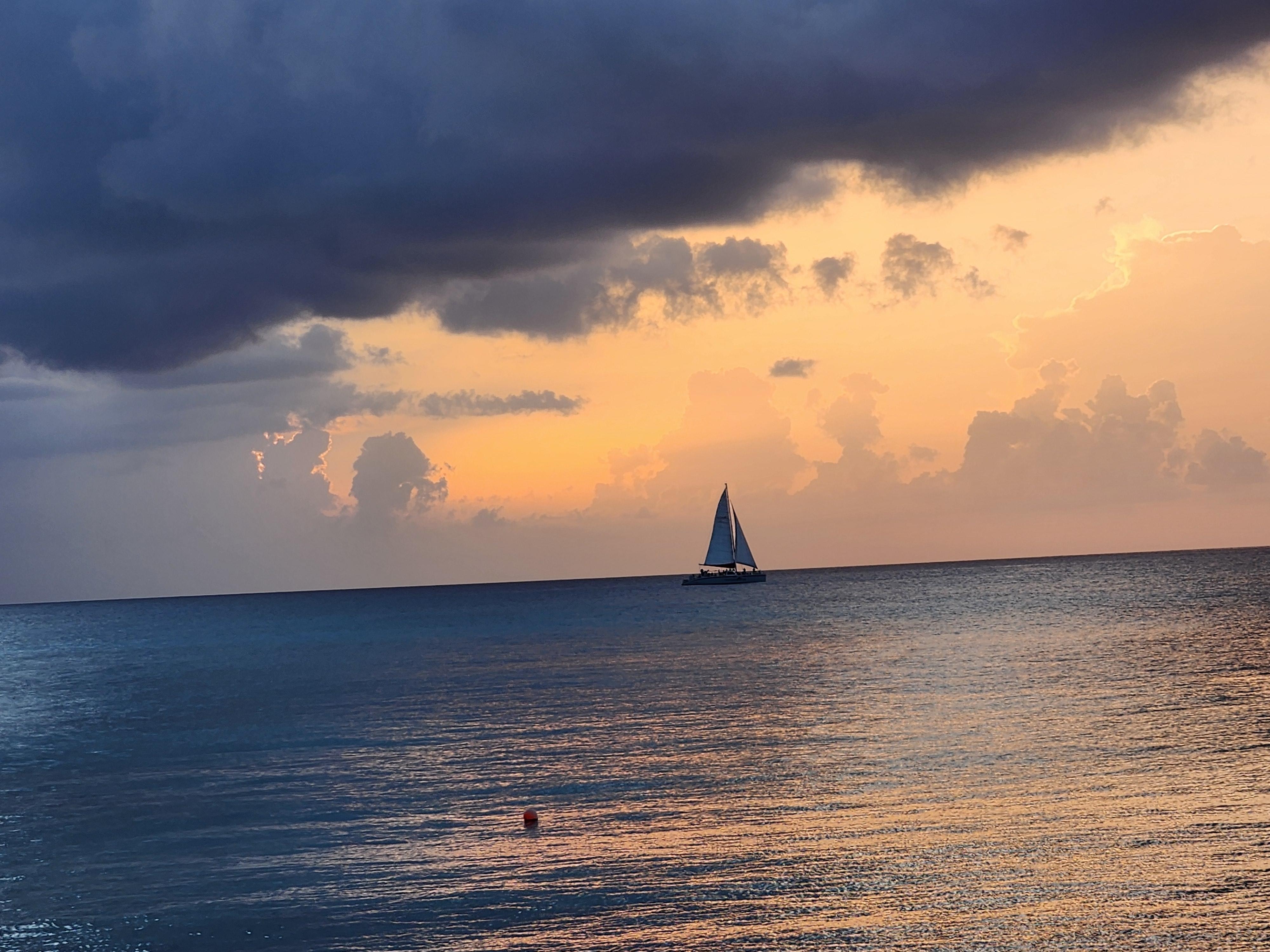 Sunset on the beach in front of the hotel.
