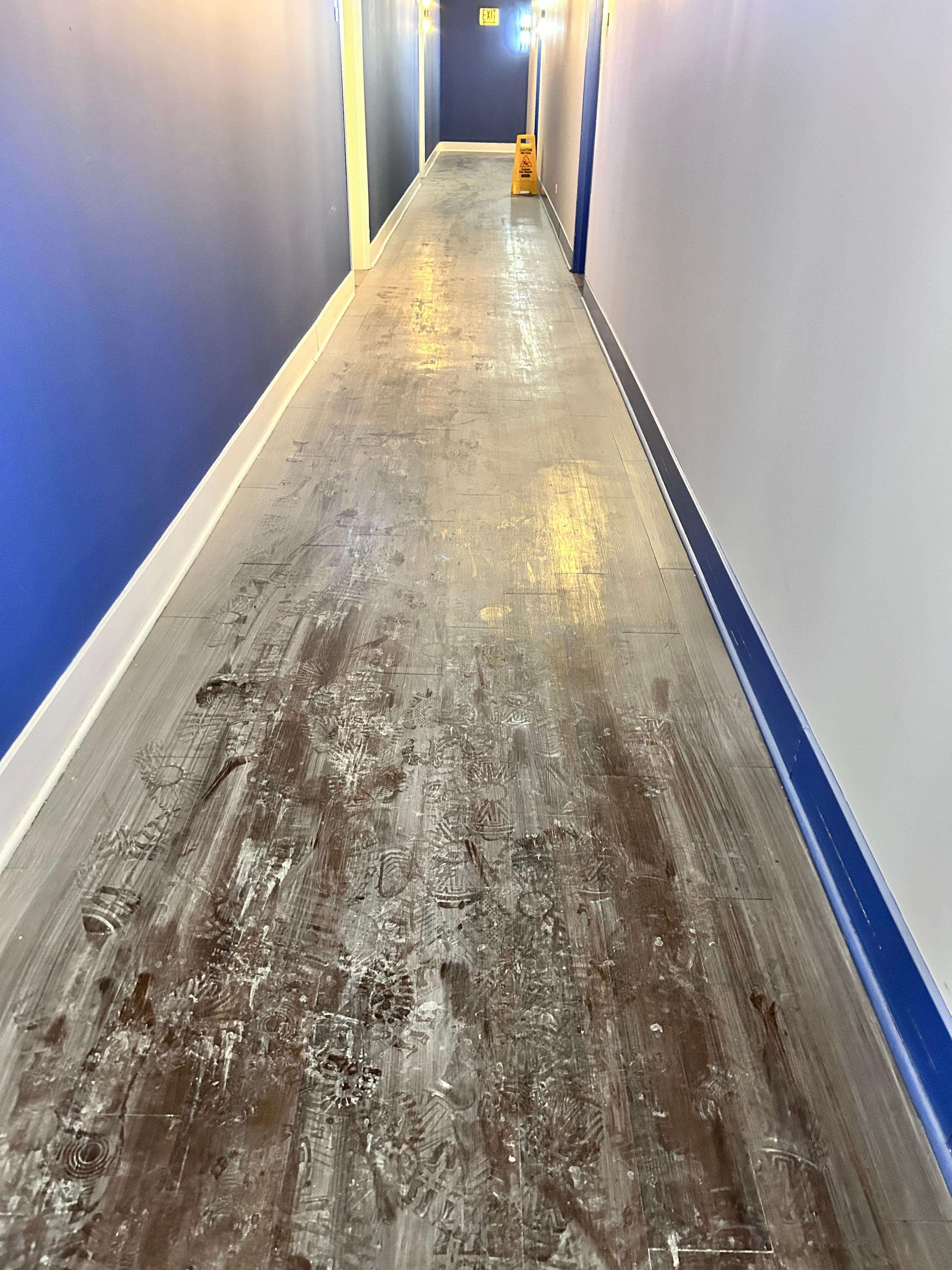 This is the aftermath of debris from the fire alarm in the hallways near a unit, particles were flying into our unit from the hall, maybe from the doorway.