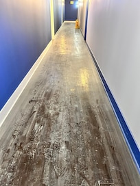 This is the aftermath of debris from the fire alarm in the hallways near a unit, particles were flying into our unit from the hall, maybe from the doorway.