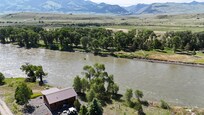 Rental home is right on the Yellowstone River, where we have many happy memories of fishing, watching Osprey fish, enjoying the moon reflection of the water, and listening to the beautiful sound of a river running in your backyard!