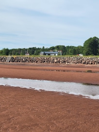 The house from the beach at low tide.