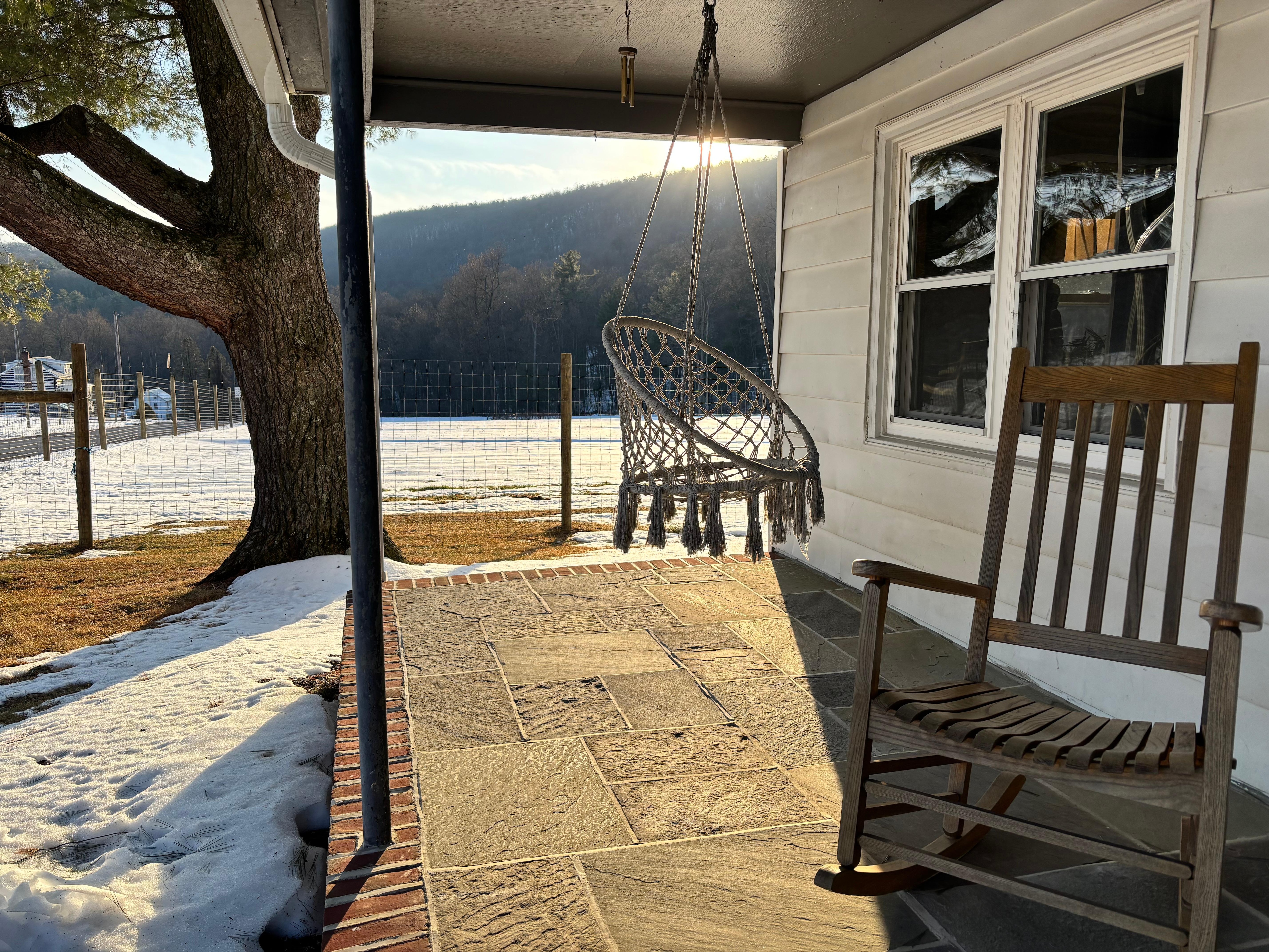 Great porch swing and rocking chair.