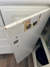 One of the "repaired" kitchen cabinets
