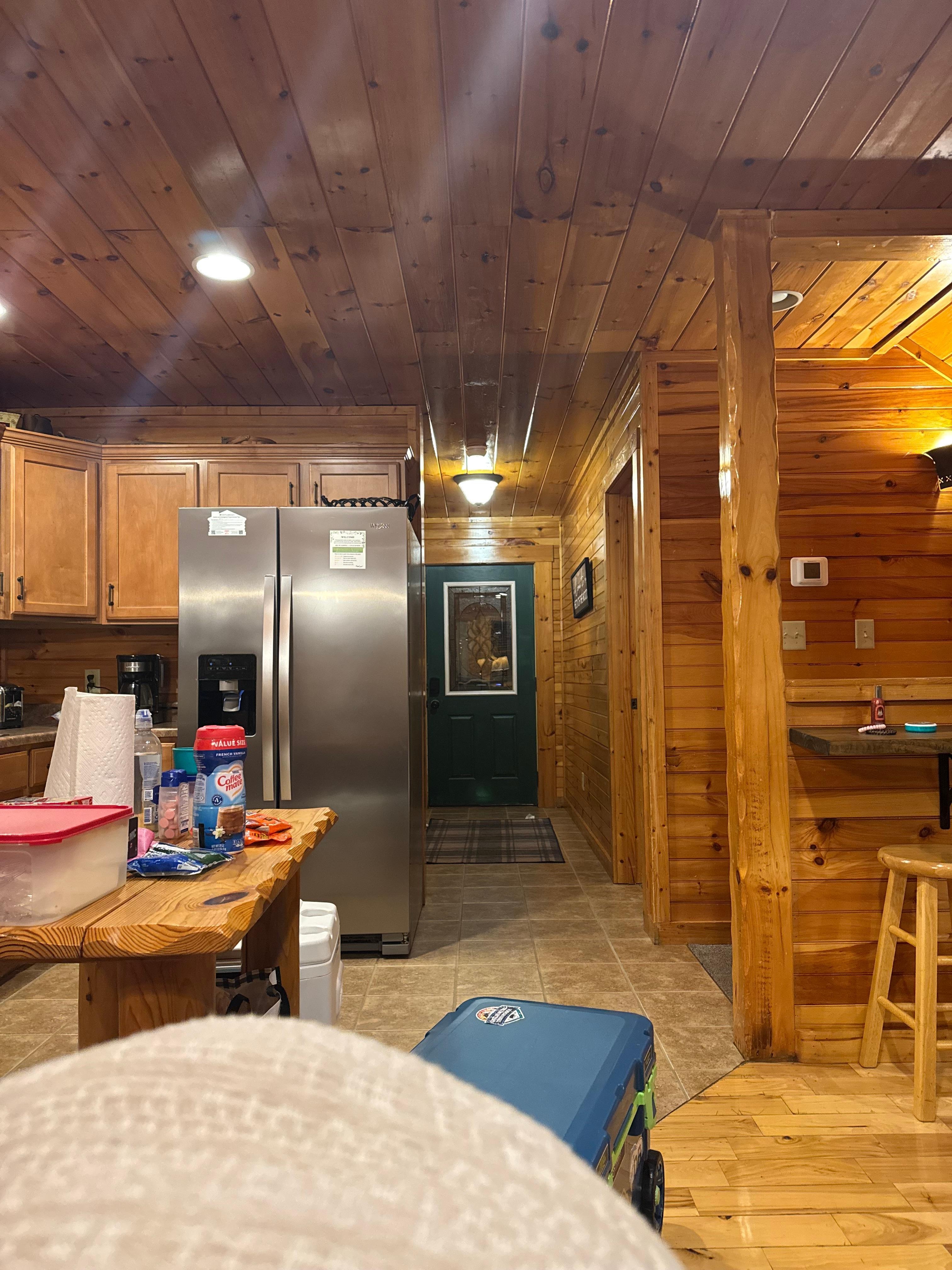 From dining room to front door of cabin. 