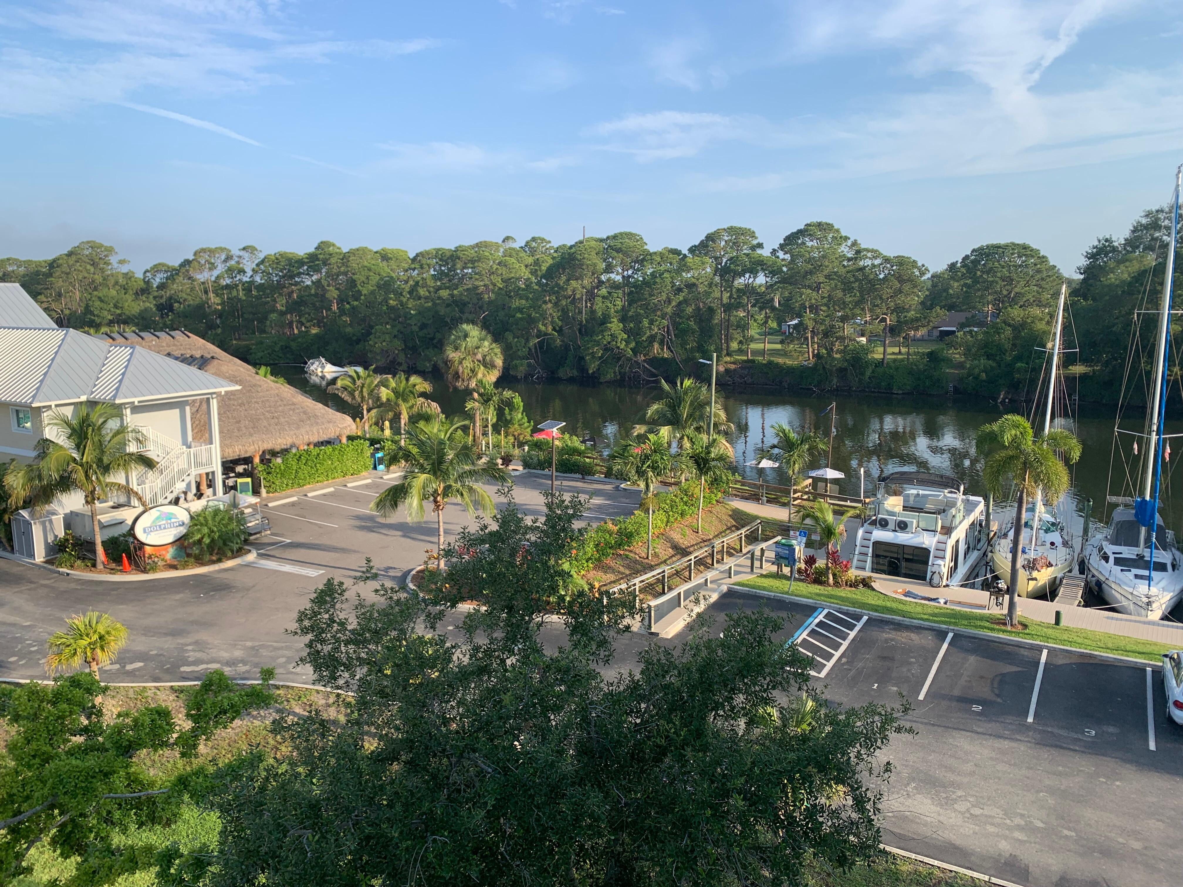 Views from balcony overlooking barge river, Dolphins restaurant. 