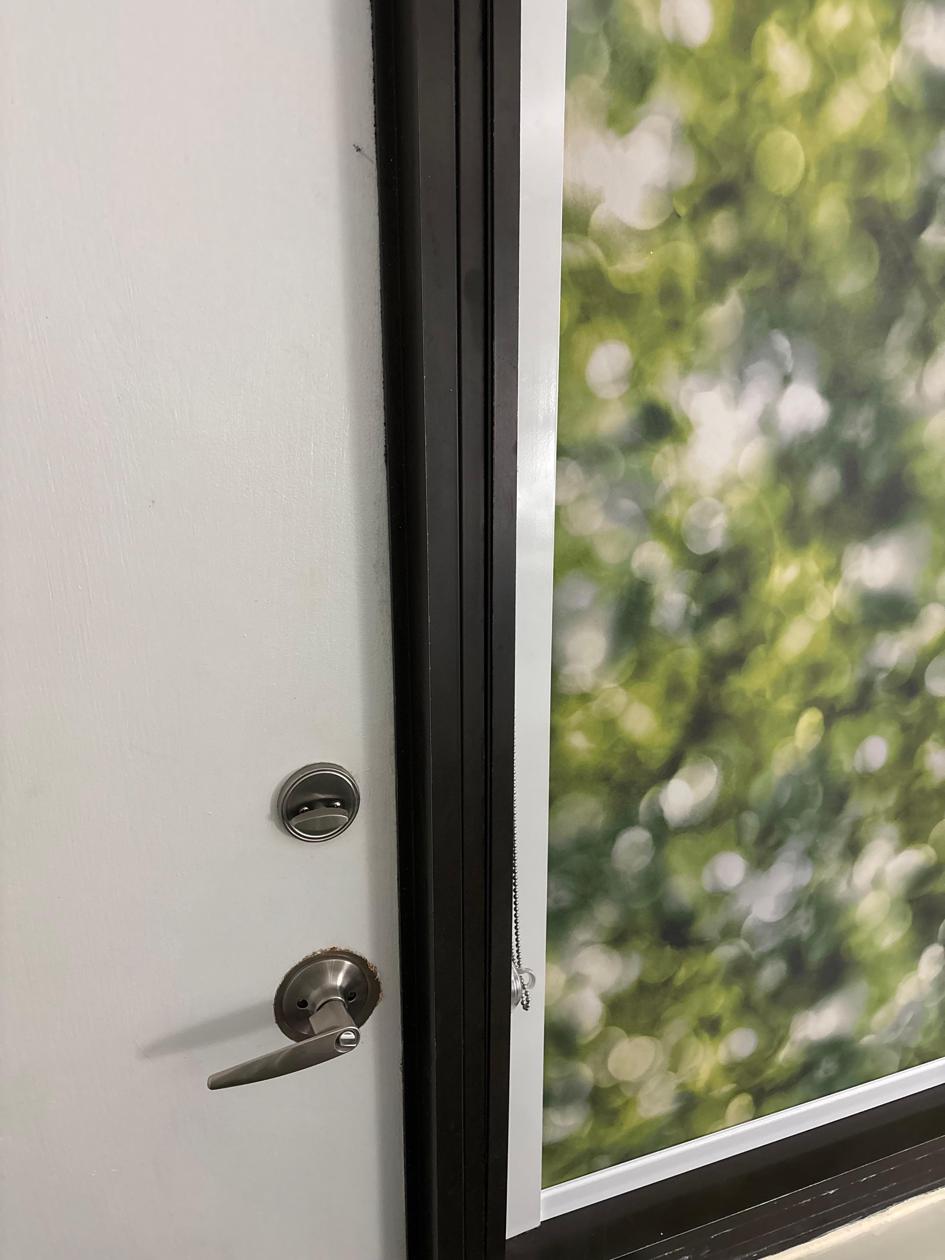 This is the back door to go onto the balcony which stuck out because someone previously had jimmied their way in after being locked out!!