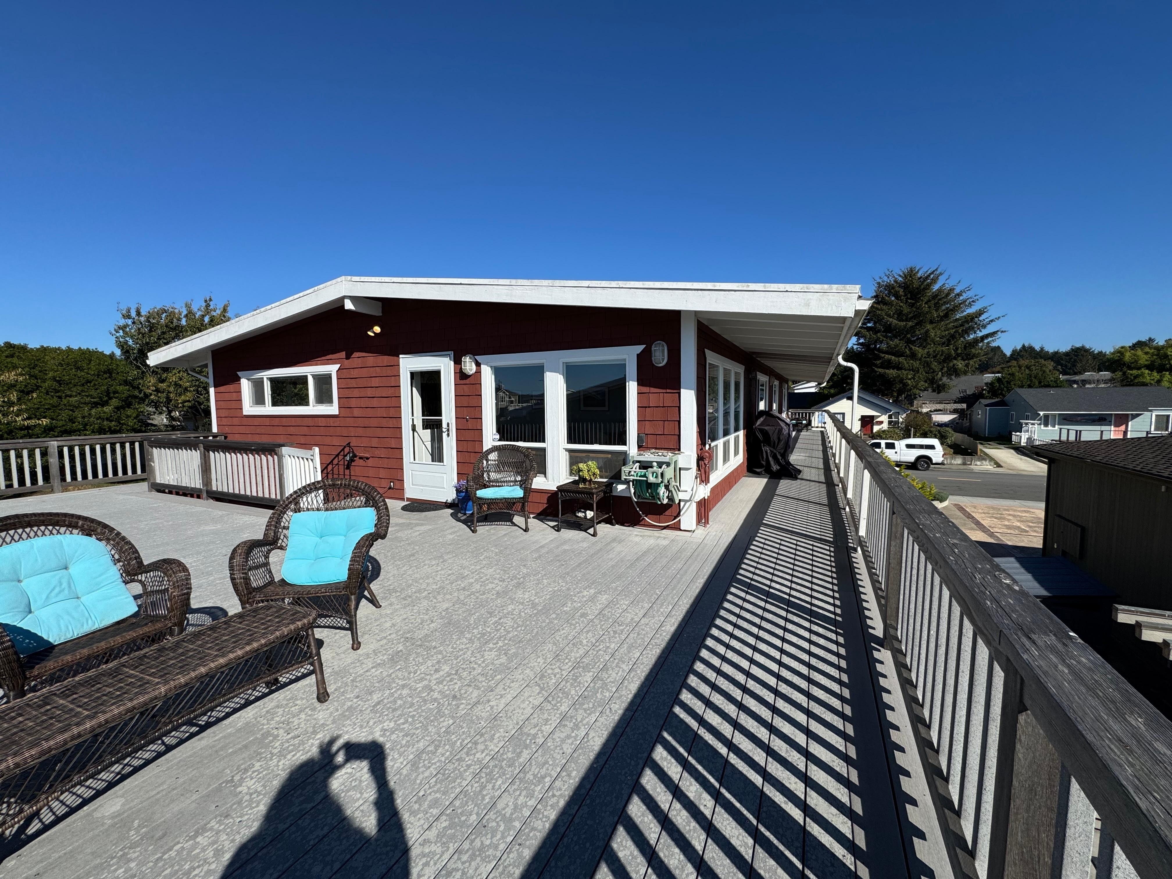 A view of the house and deck