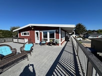 A view of the house and deck