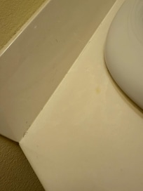 Hair around the sink and in the grooves