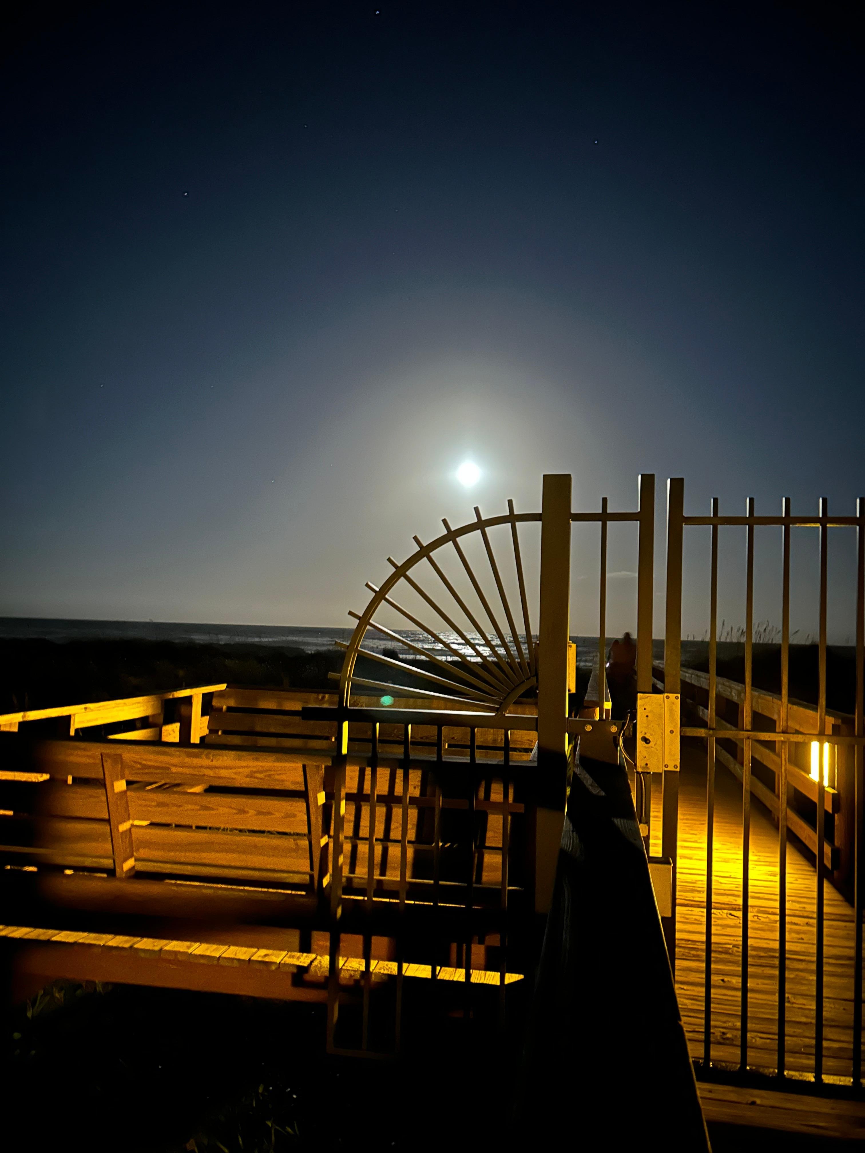 Harvest moon at beach access gate
