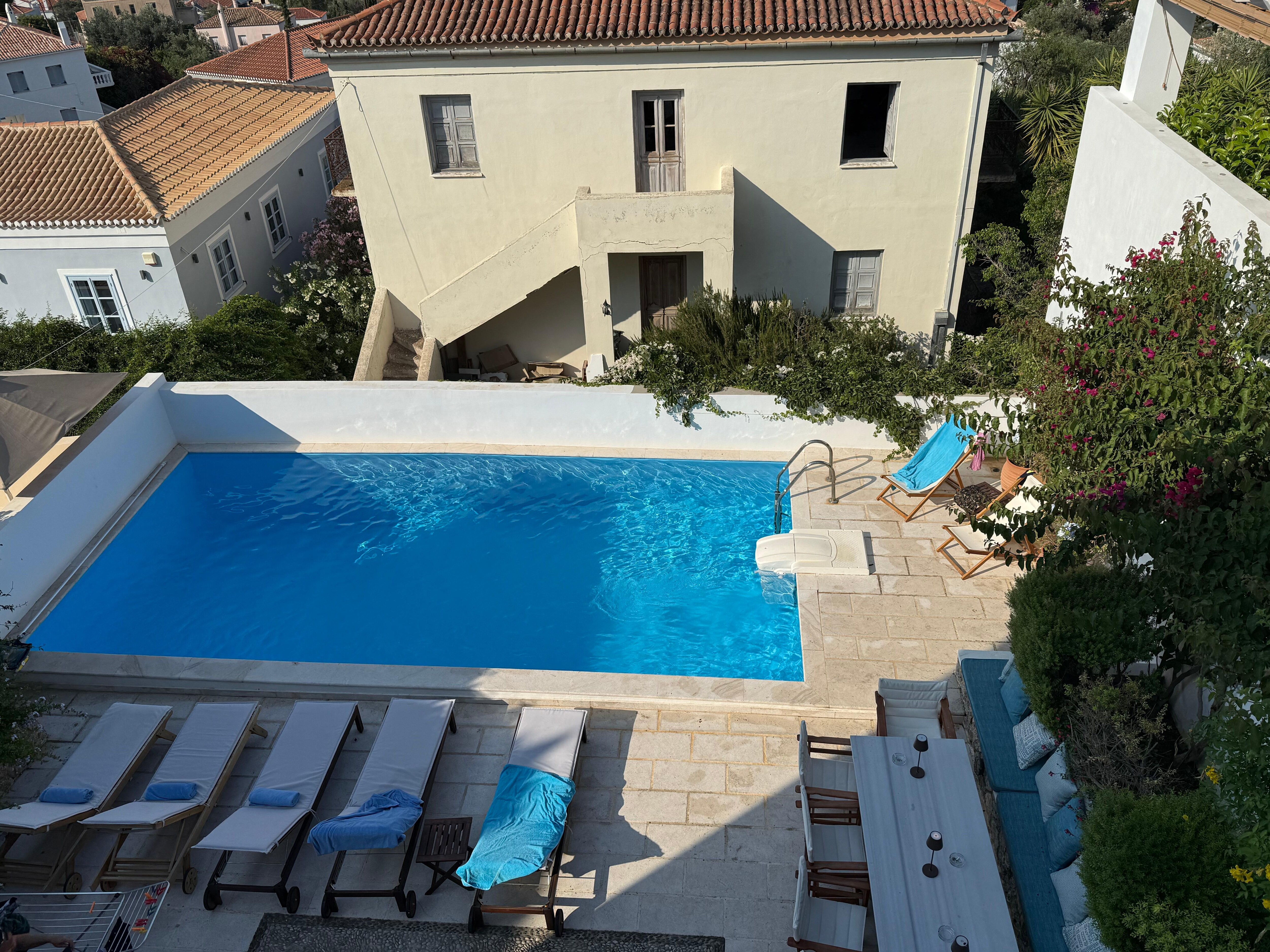 view of the pool from the room upstairs
