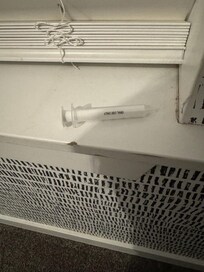 Syringe on the window sill