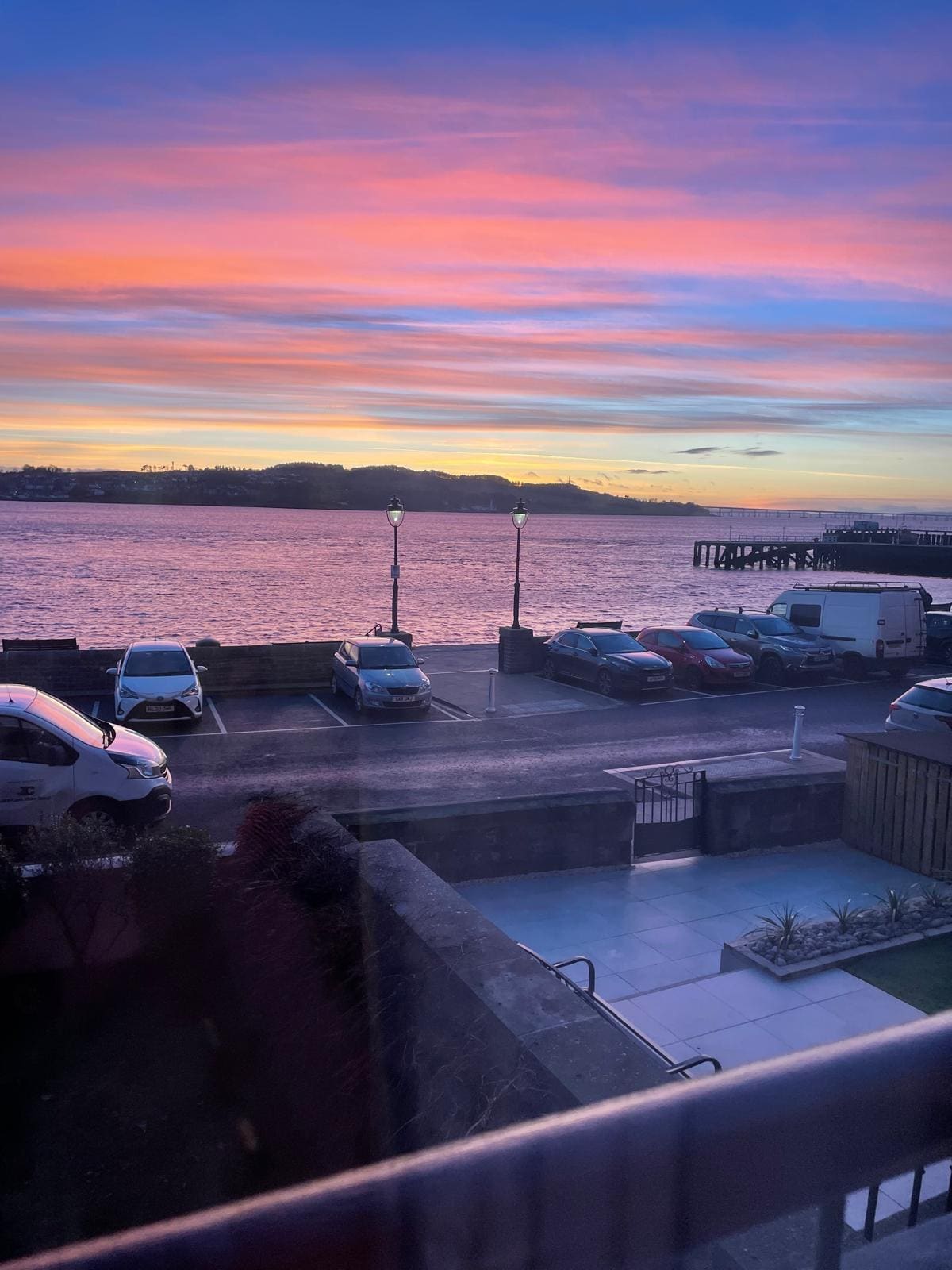 View of beautiful sunset from apartment lounge.