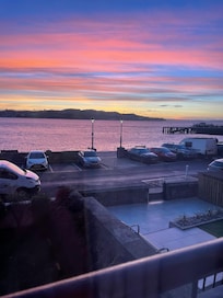 View of beautiful sunset from apartment lounge.