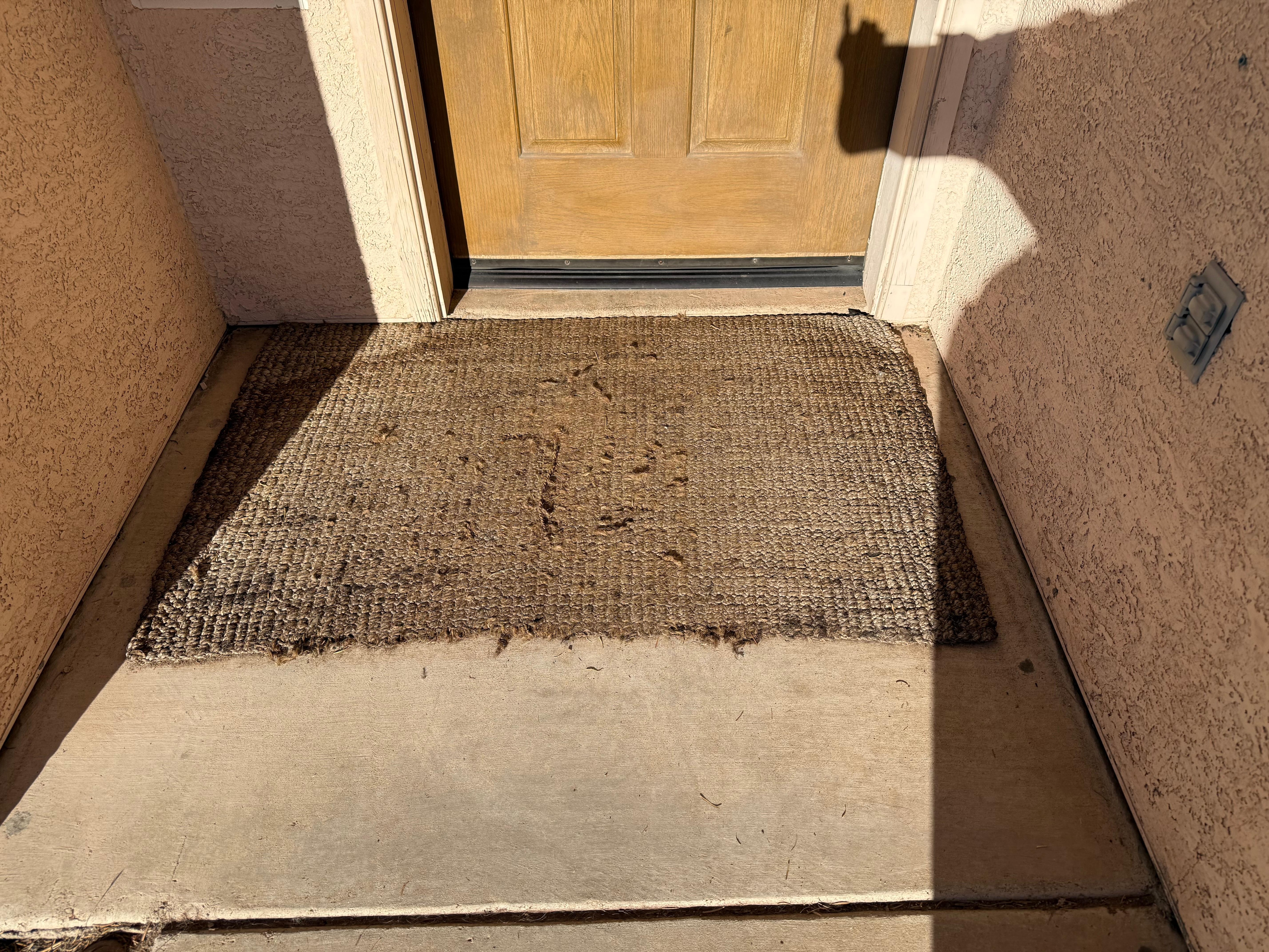 Disintegrating front door mat mentioned in review 
