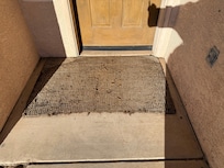 Disintegrating front door mat mentioned in review