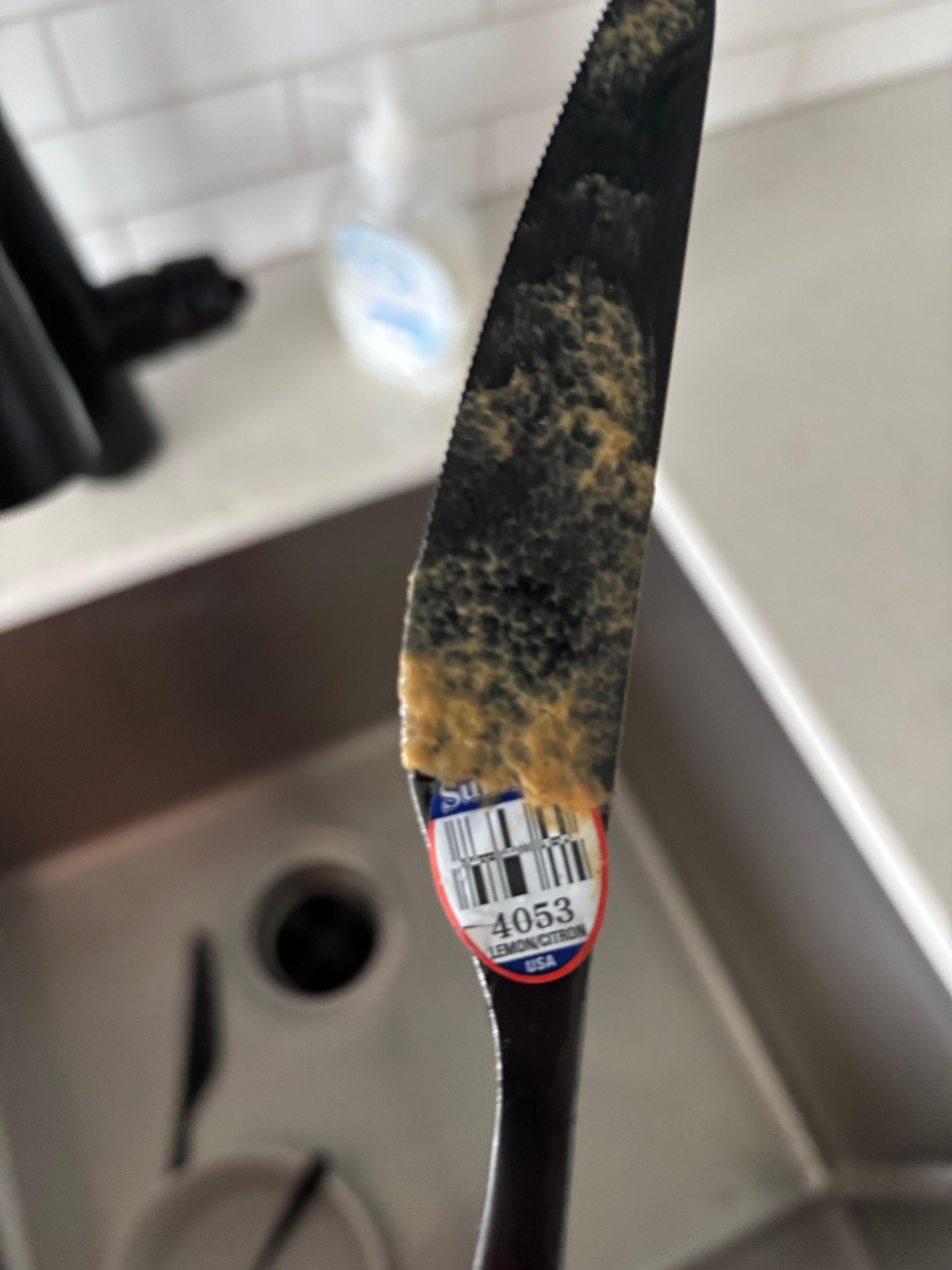 This knife was like this in the silverware drawer - with the purchase label still on it, and not clean.
