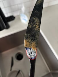 This knife was like this in the silverware drawer - with the purchase label still on it, and not clean.