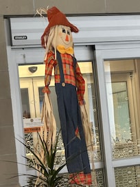 Halloween decor by the door, by hotel parking lot