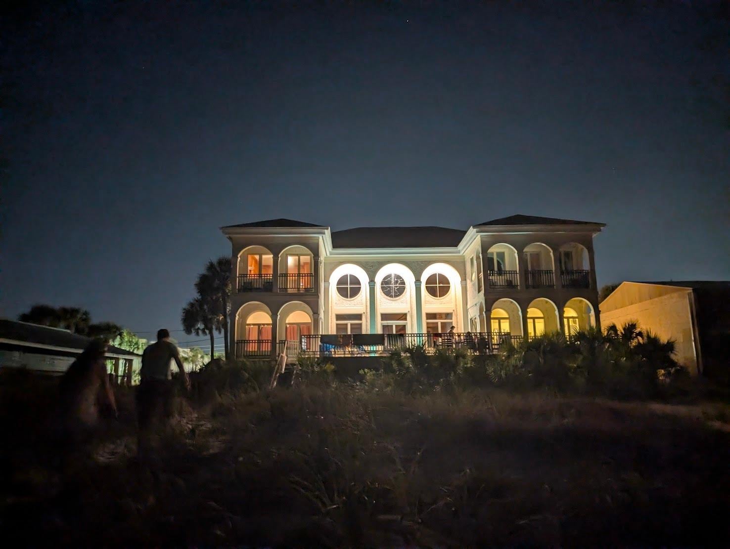 Illuminated house at night.