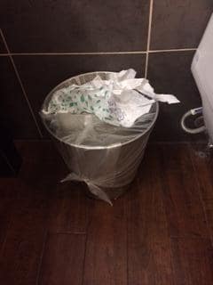 Trash basket won't let you put trash in it because it was tied so tight!