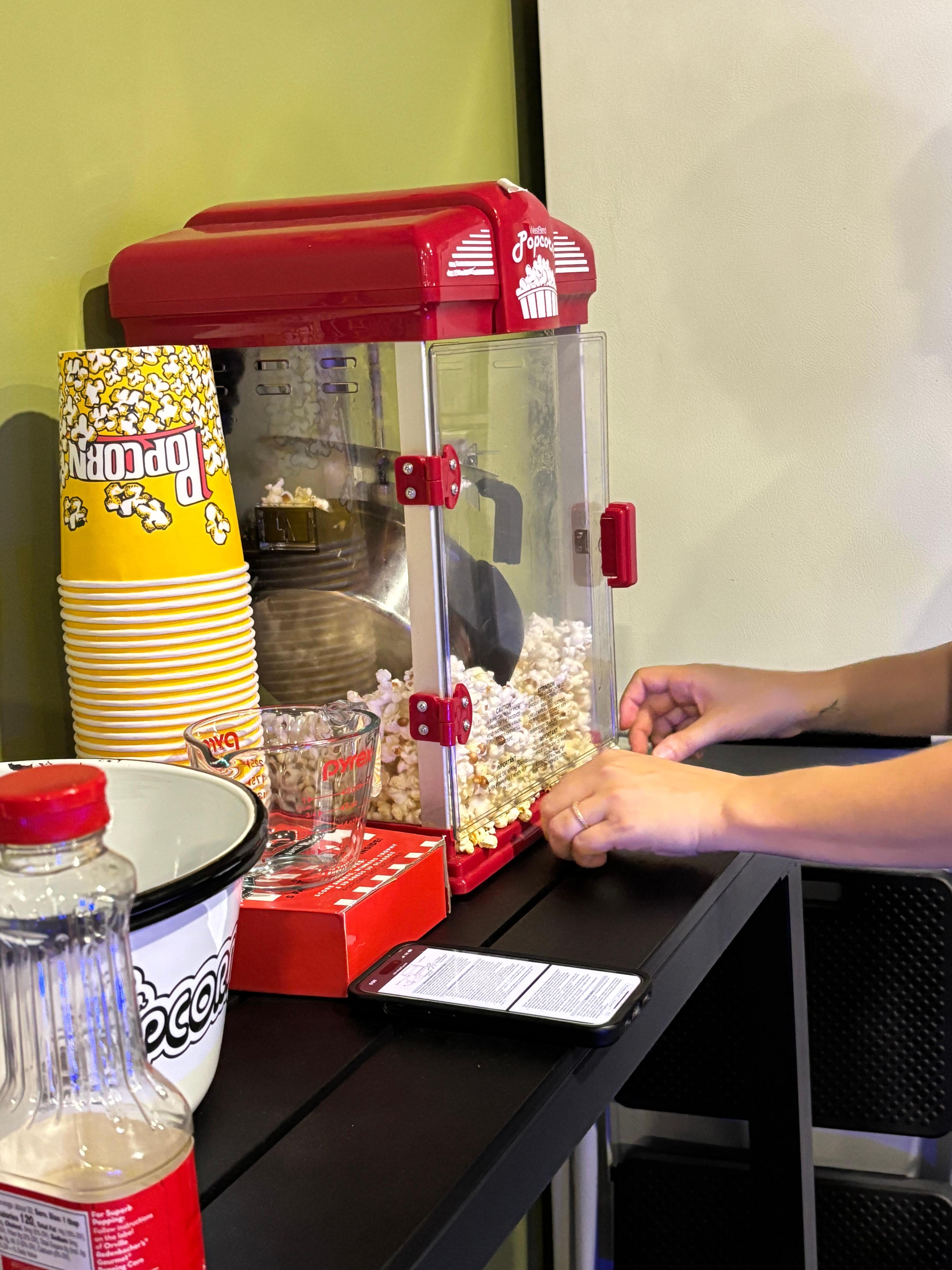 Easy to clean popcorn maker with multiple flavor shakers and accessories 