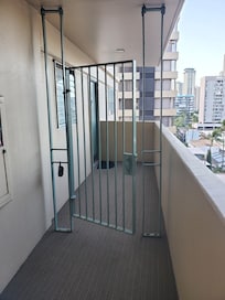 End unit with door behind gate (no next-door neighbors)