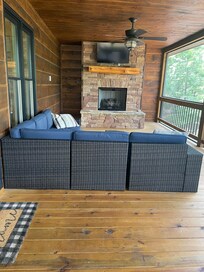 Screened porch with television and great seating.