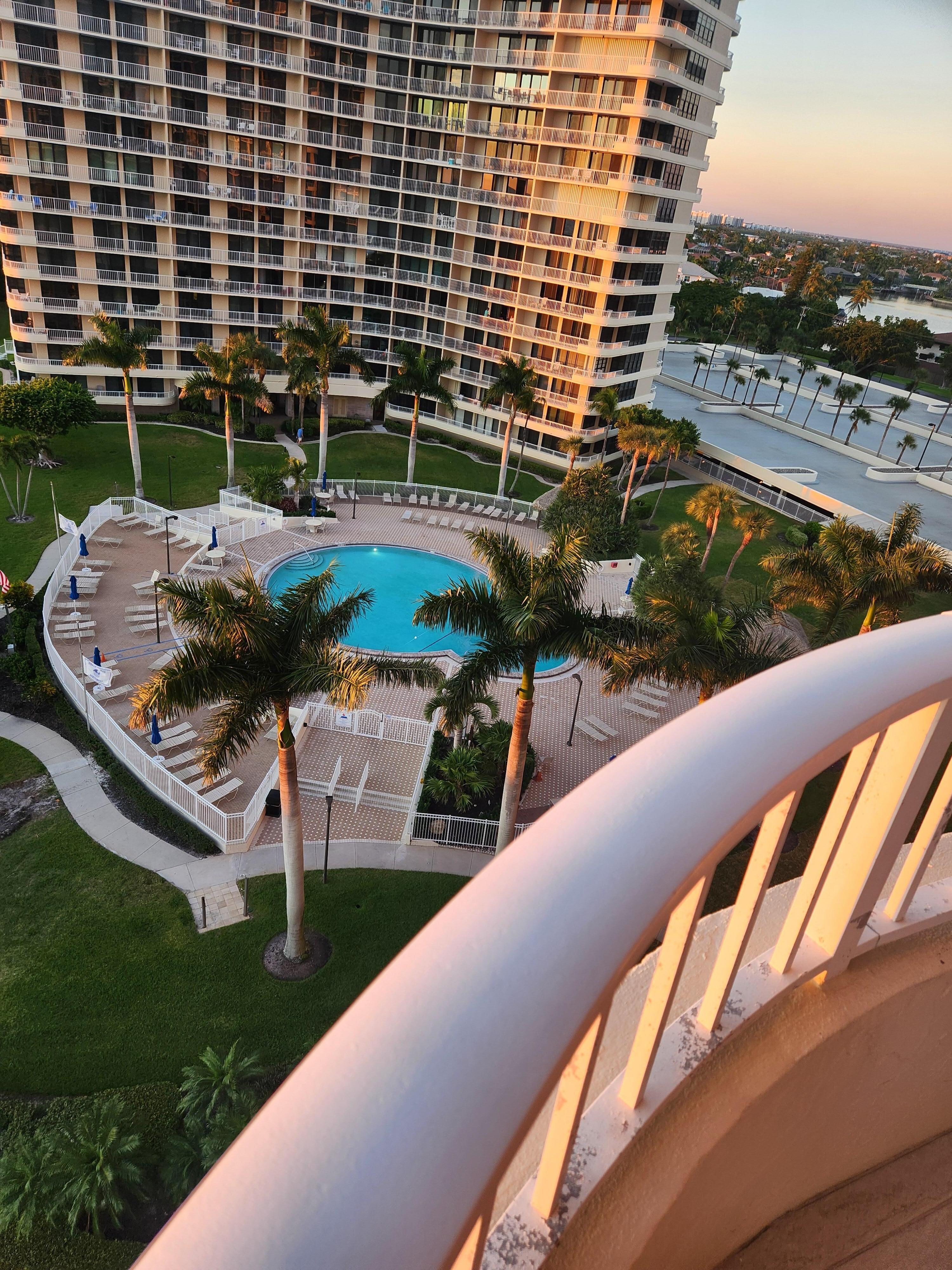 View of pool, standing on front balcony.