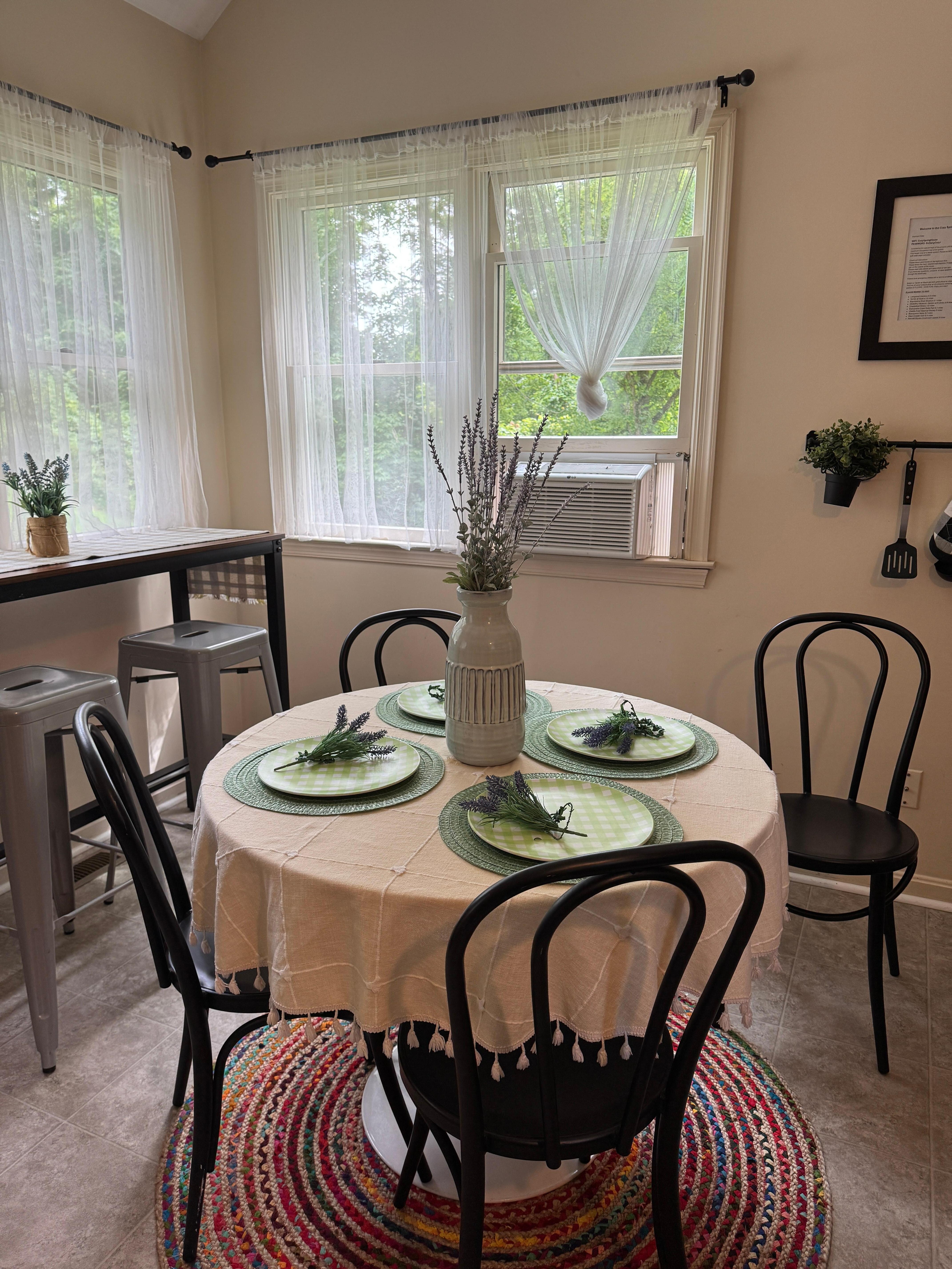 Good size kitchen with your cheerful  decor. 