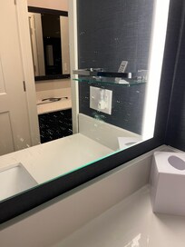 Bathroom mirror a mess. The shower was dirty too
