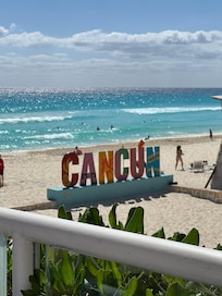 Cancún sign on the beach
