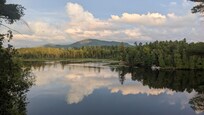 The attached photo shows Scarface mountain across the lake taken from the deck.