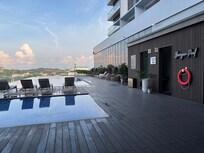 Morning pool view facing breakfast terrace