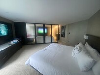 Bedroom in our suite with translucent wall separating it from living space st White Oaks