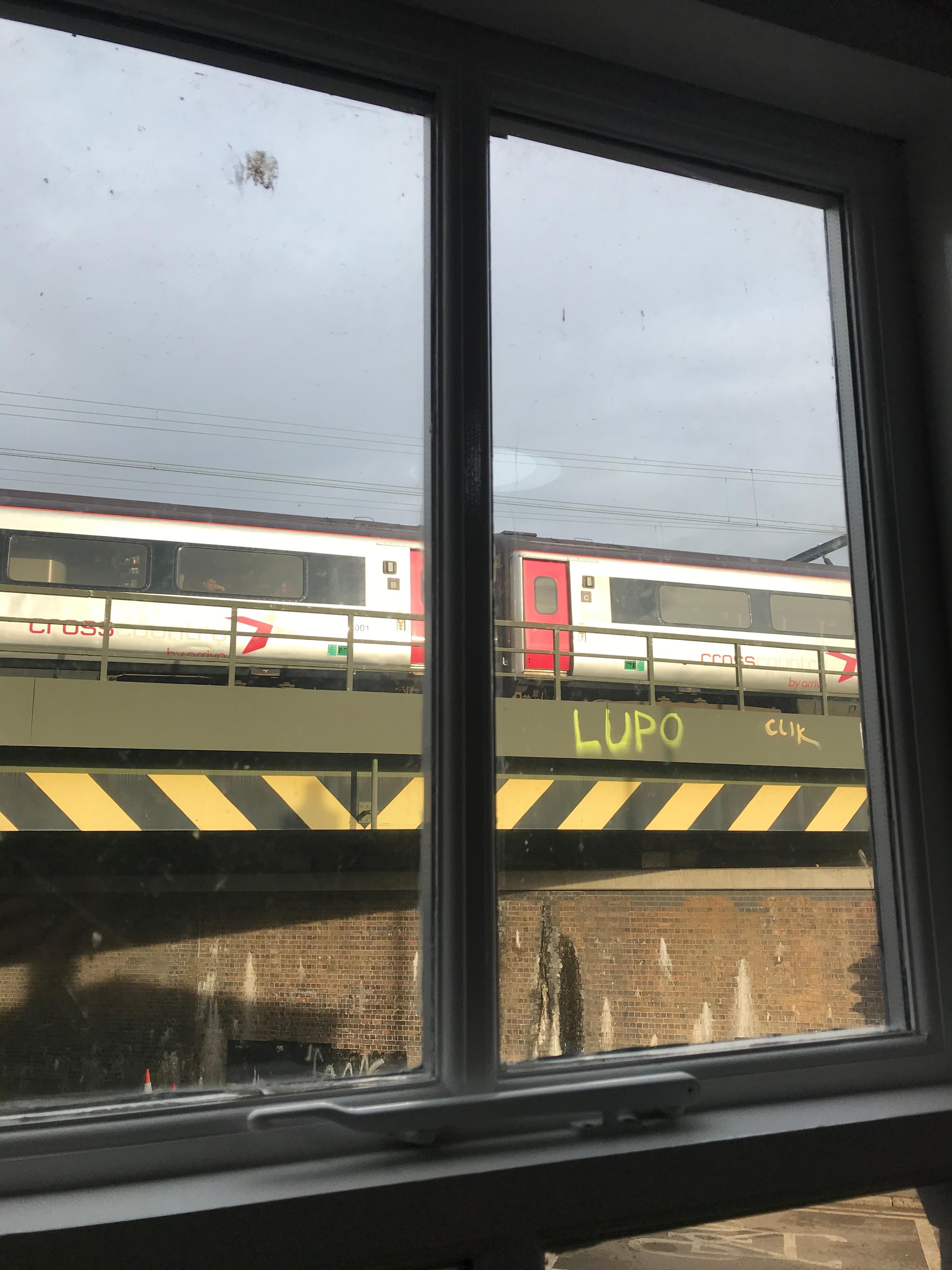 Trains pass every thirty seconds right outside the bedroom window