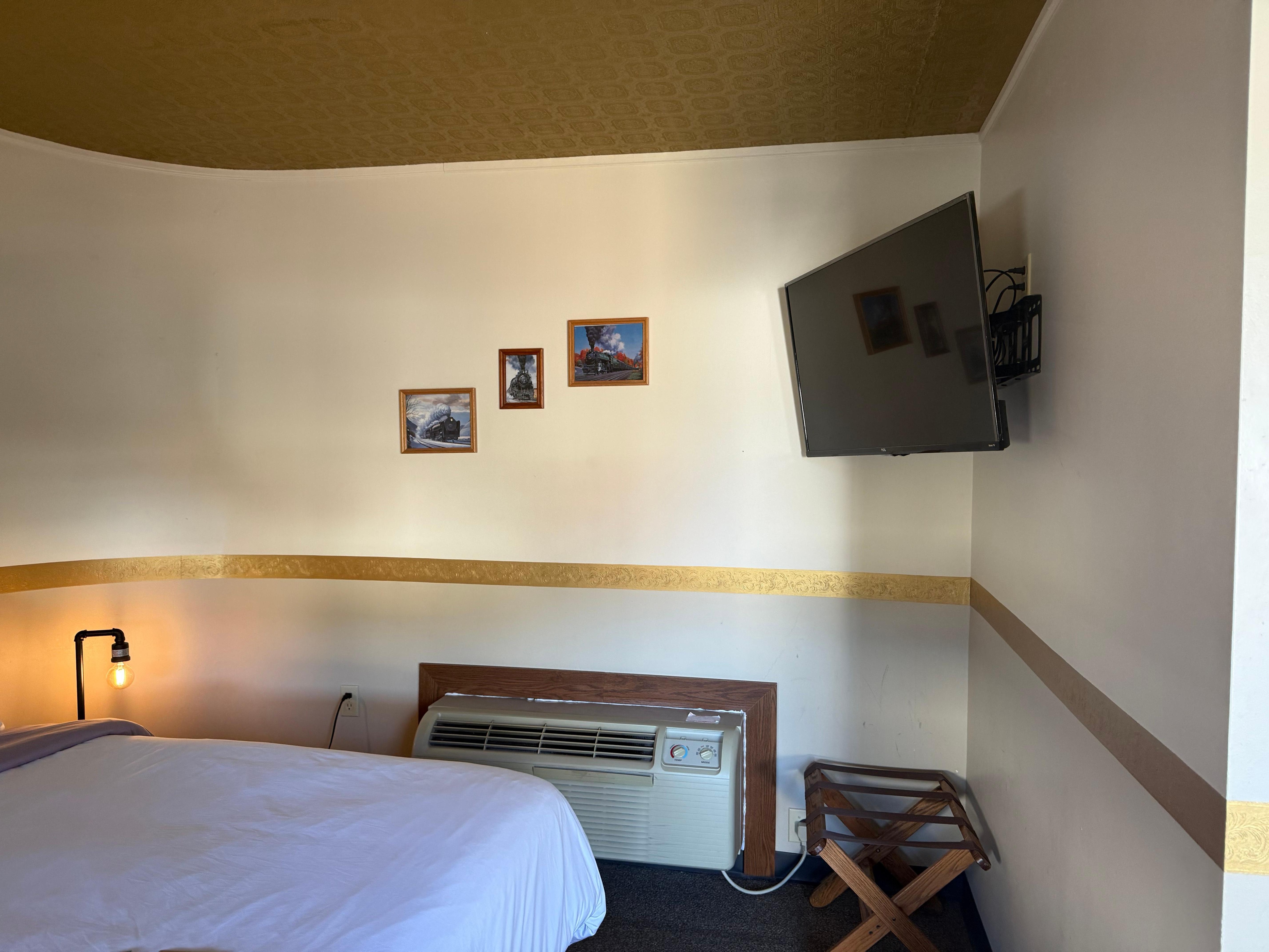 Tv on wall with temperature heat/cool 