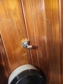 What maybe a grab bar holder (?) in need of repair