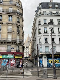 Sacré-Cœur greets you every time walking toward the Anvers station, a step away!