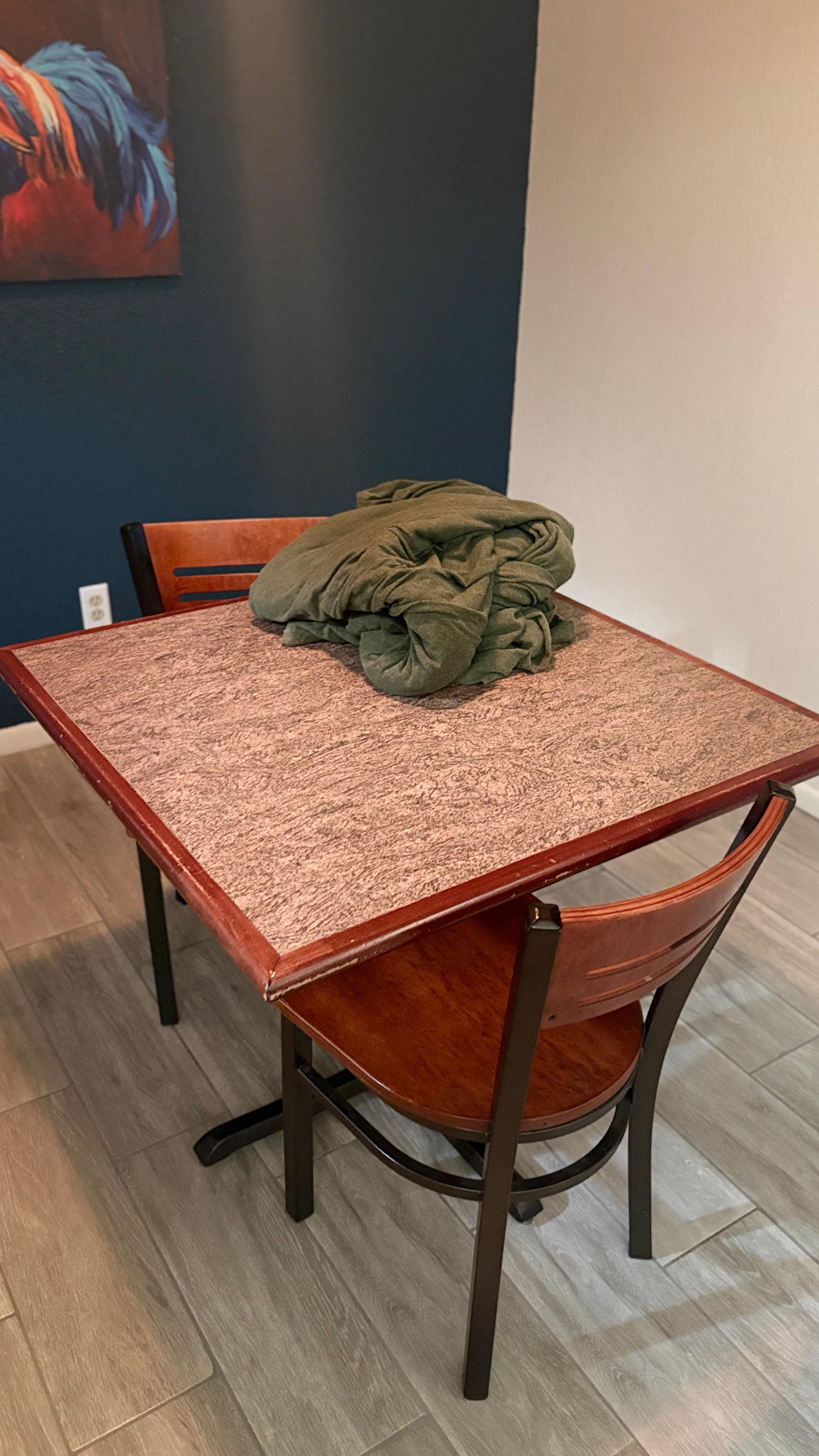 Dirty linens sitting on dinette table upon check in