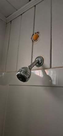 Orange plastic ball plugging wall hole