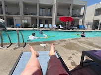 Relaxing by the pool
