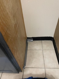 There was grey tape around the room. Maybe it was their caulking?