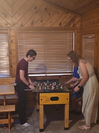 The boys discovered the food ball table