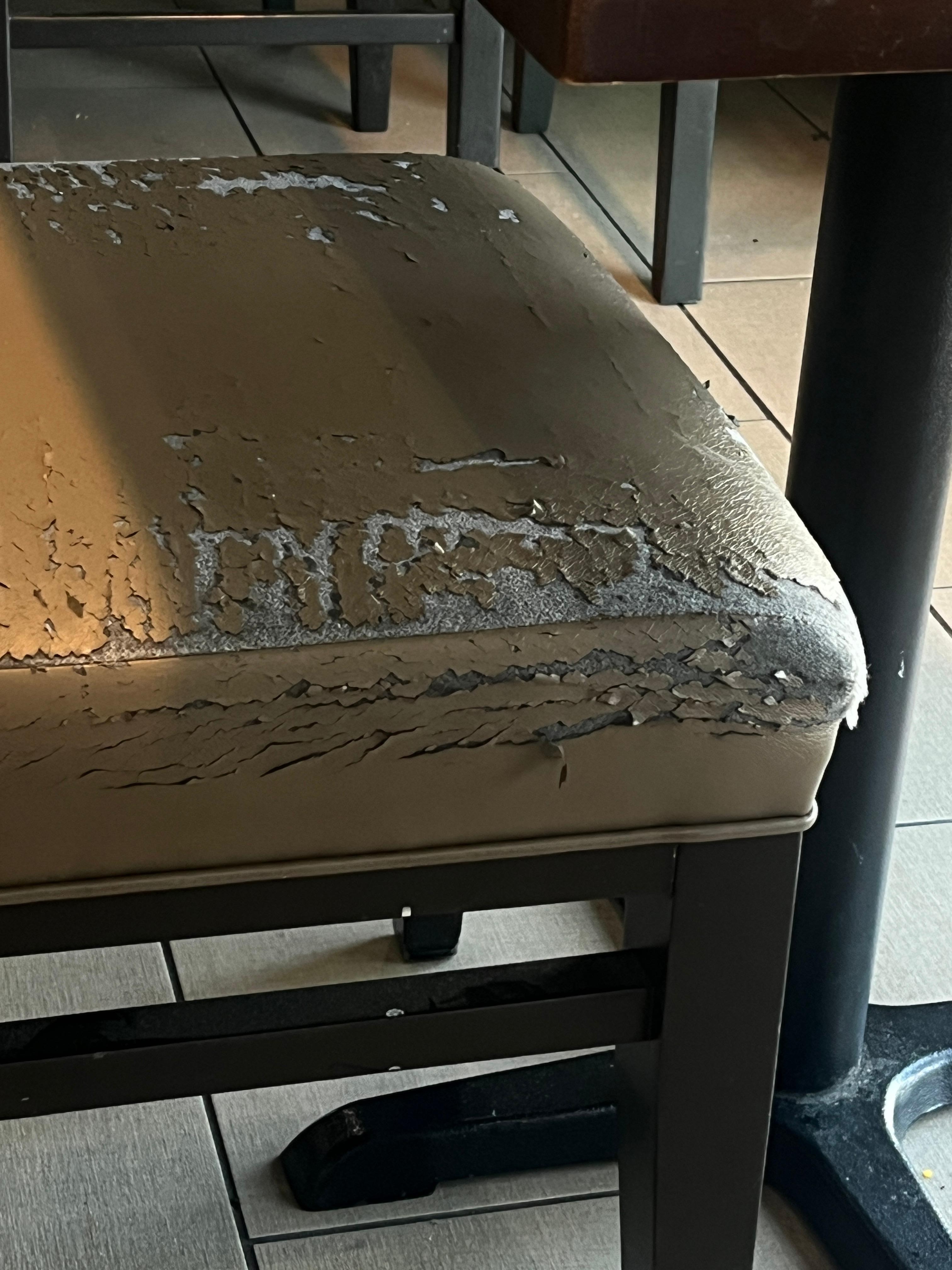 Multiple torn chairs