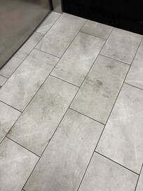 Common area floors weren't very clean and needed a good sweep and mopping.