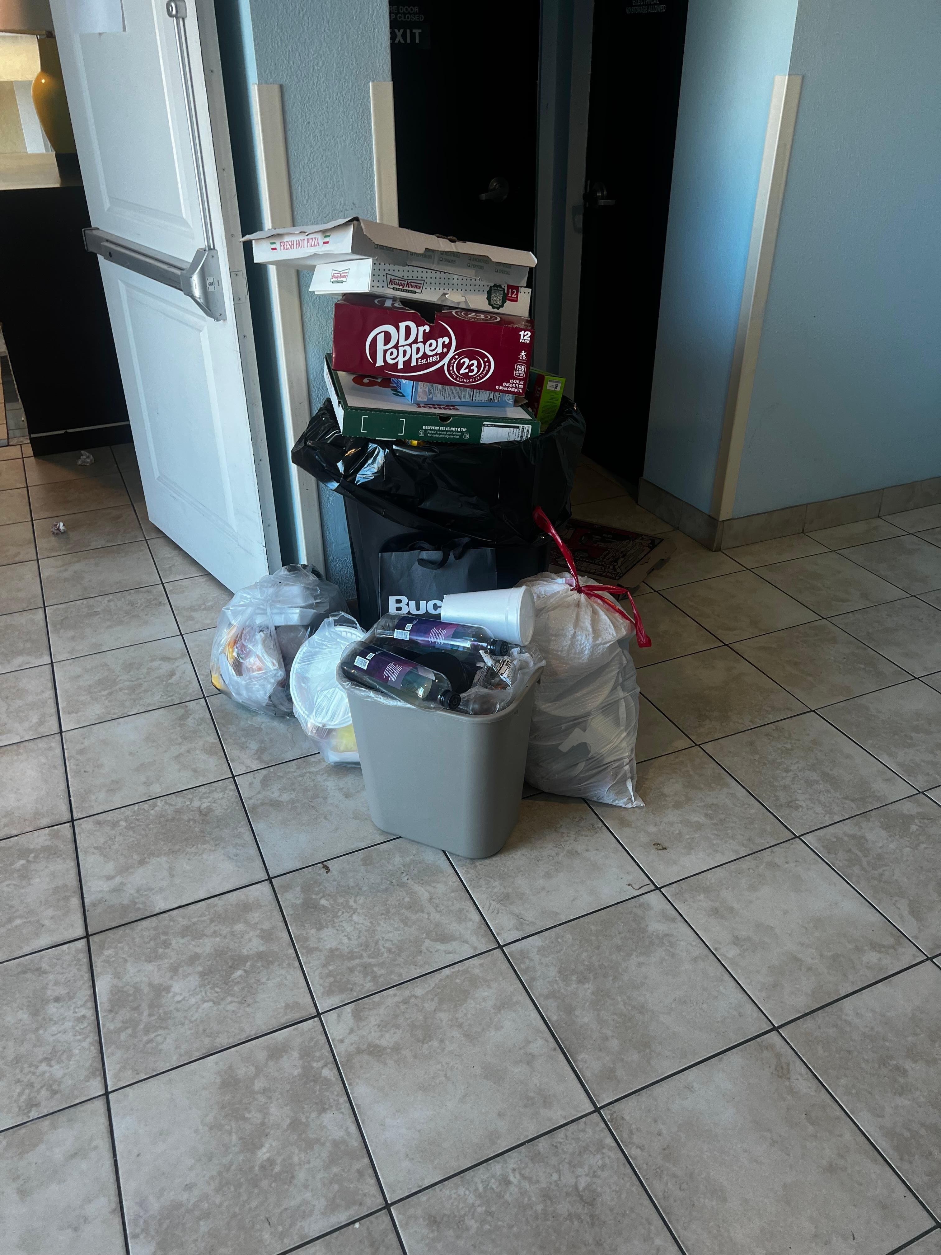 Garbage pilled in hallway for days 