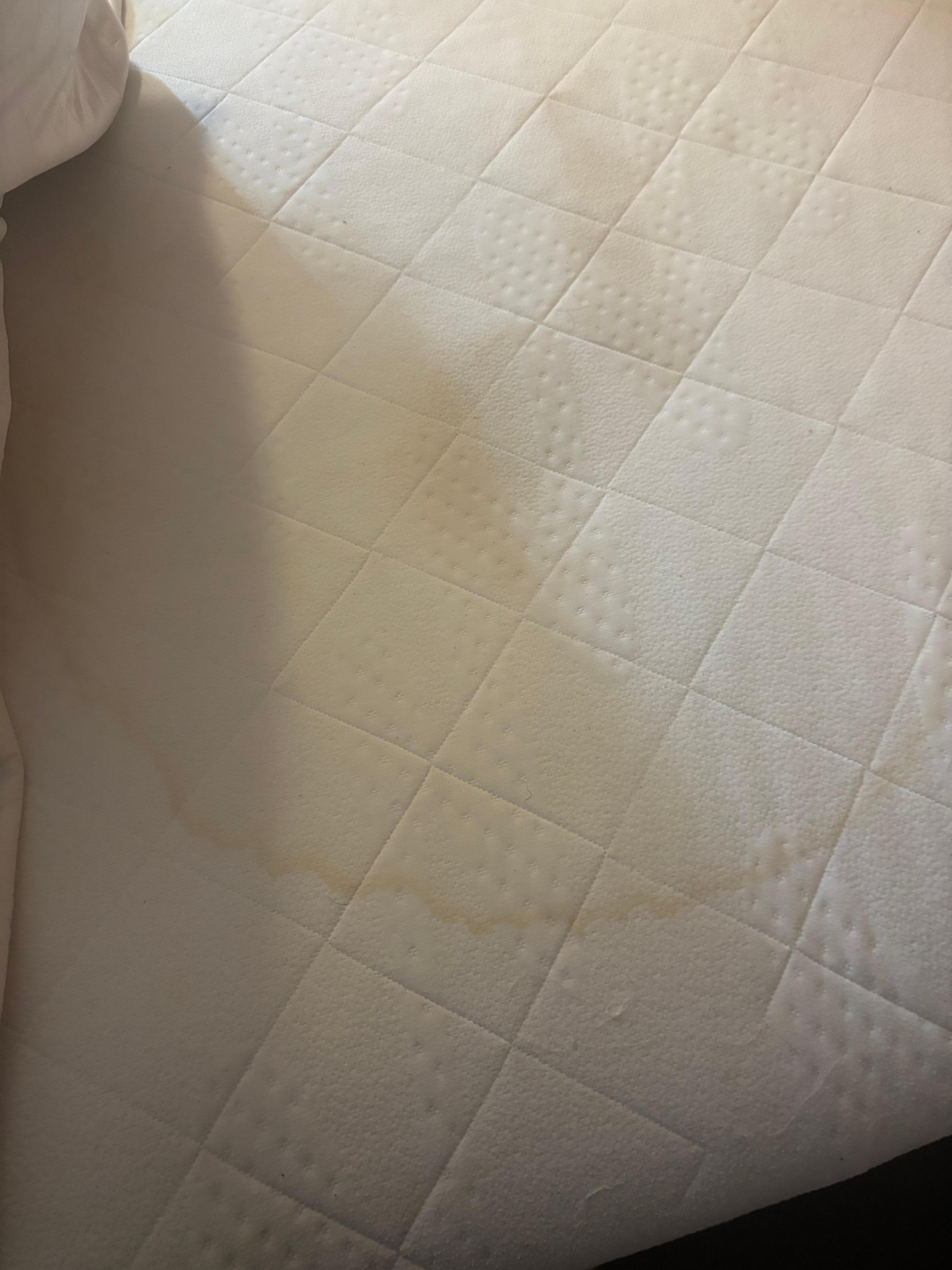 Big stains on mattress topper!!