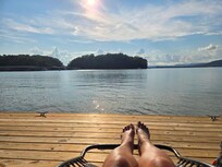 From our dock....so relaxing g watching the boats come + gon from marina just across the cove.