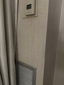 Stains on wall under thermostat